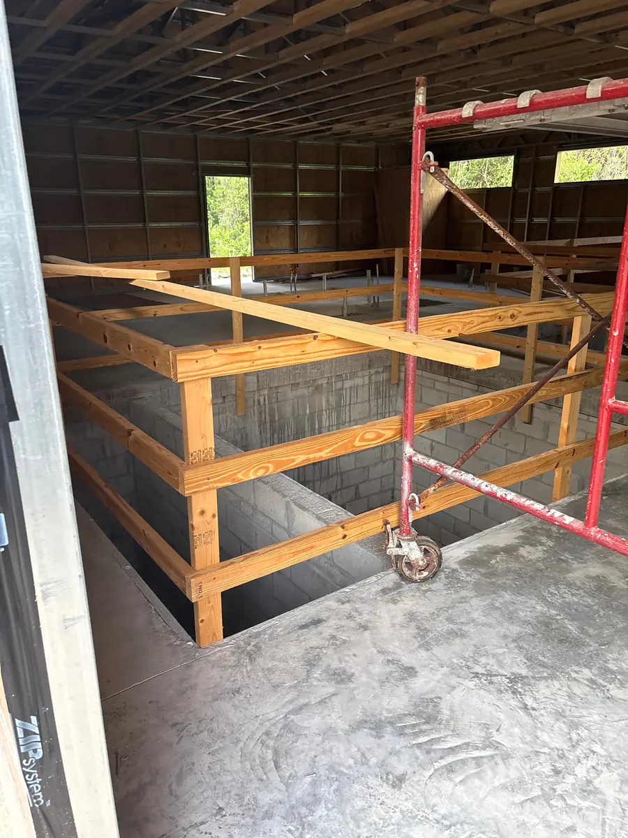 Prepared men's mikvah main bor formwork area awaiting concrete pour